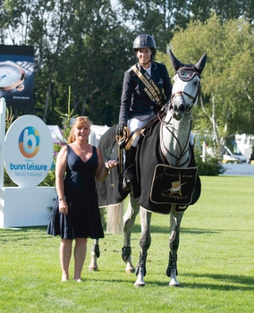 Laura Kraut wins Champagne Cave Winter Grades B & C Championship at Hickstead